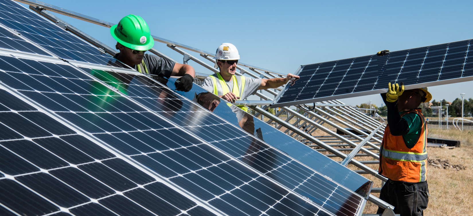 Mens working on construction of Solar Panels Power Plant